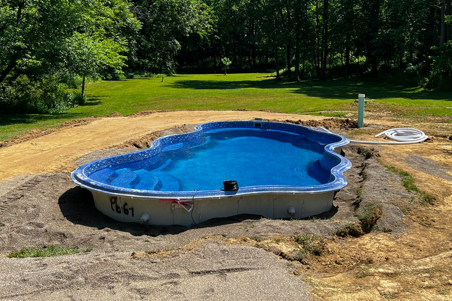 The Pool House - Inground Pool Installation